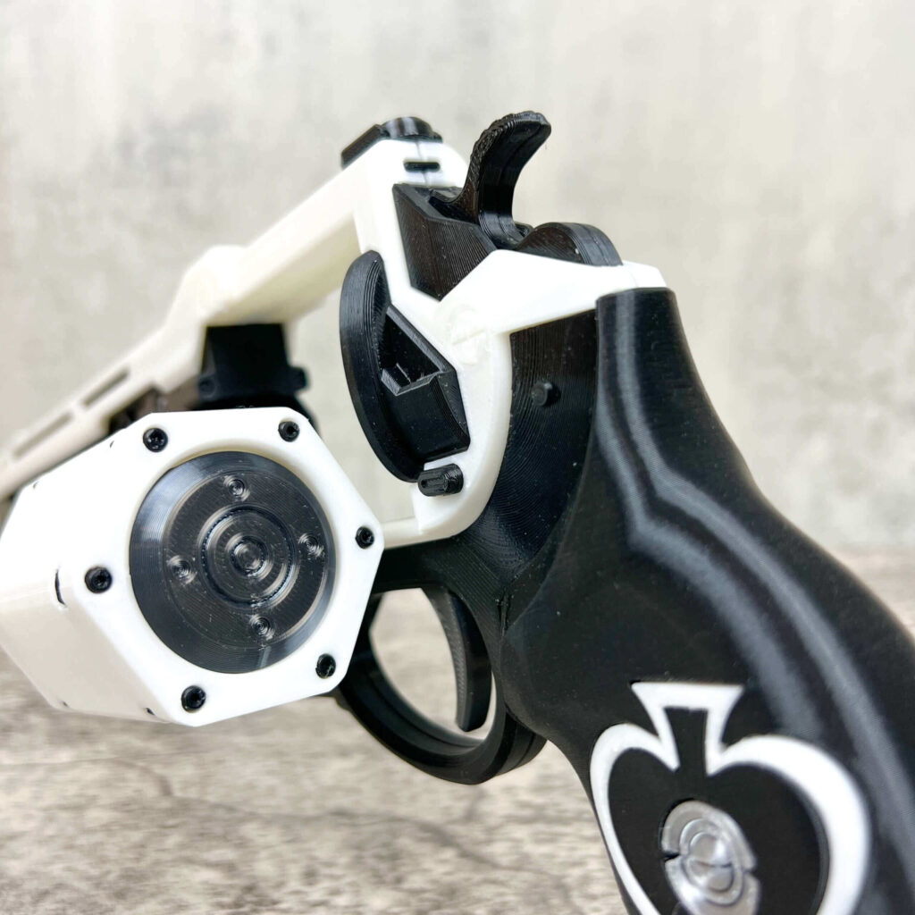 Ace of Spades replica held in a hand to show its scale